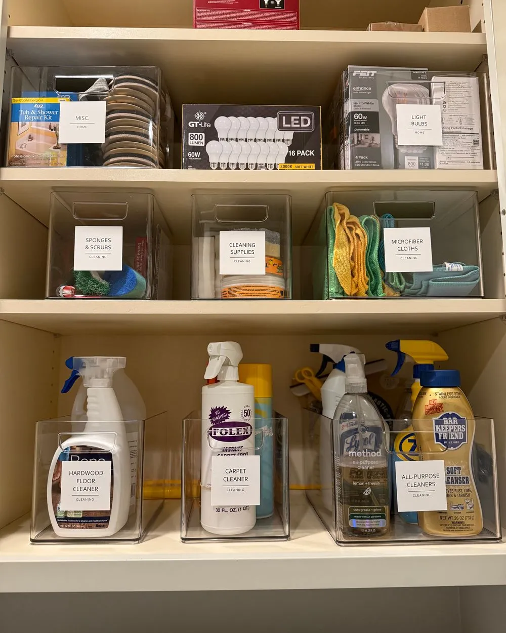 Labeled cleaning supply cabinet